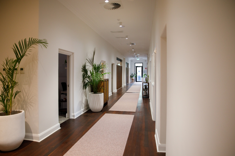 The elegant hallway of a high-end psychology practice in Perth.