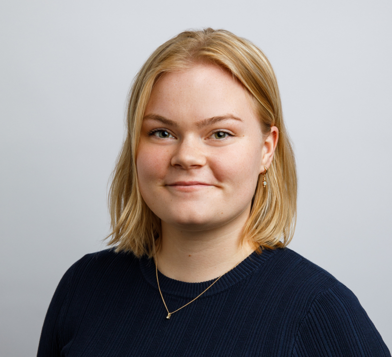 A lady called Kiana wearing a black top.